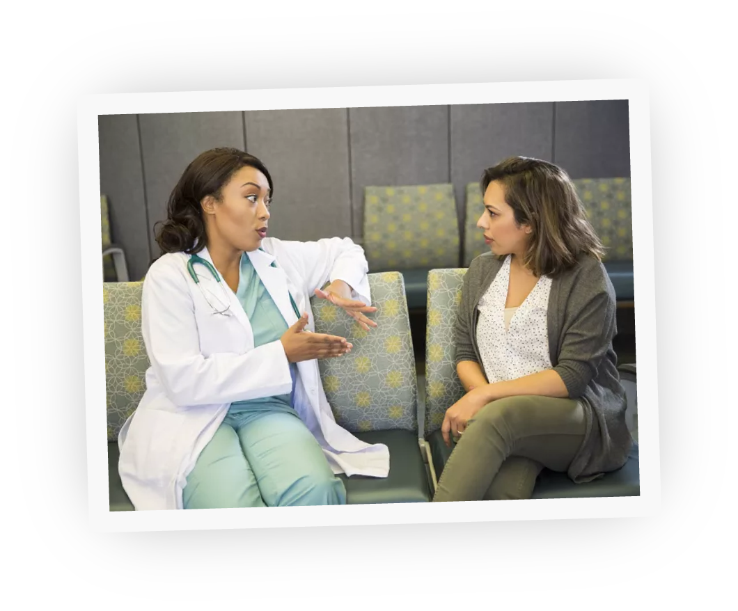 Physician and patient conversing